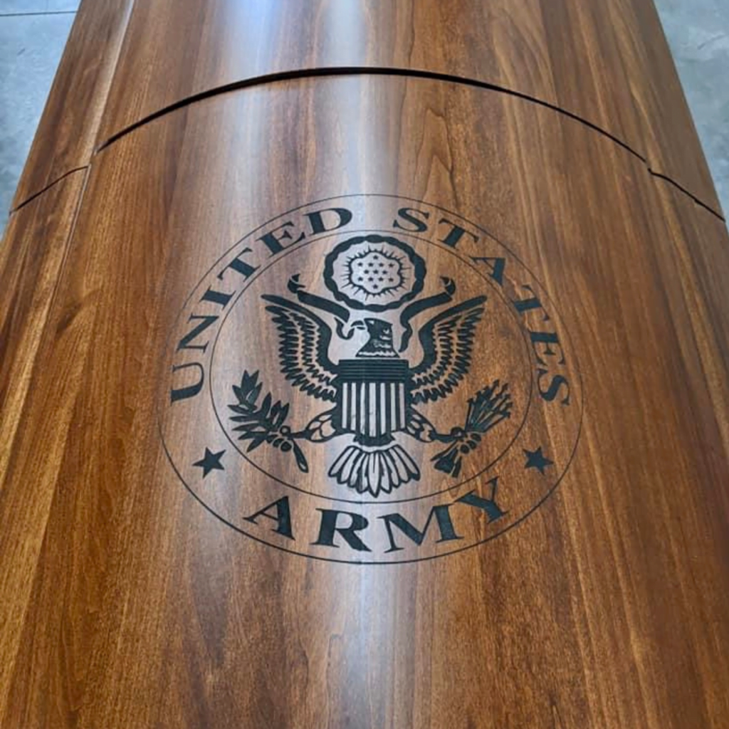 Laser-Engraved U.s. Army Emblem On A Polished Wooden Casket.