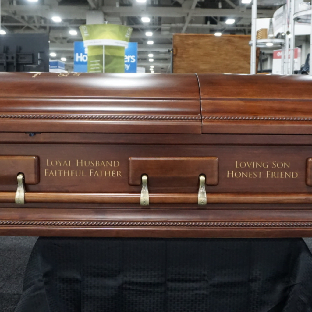 Laser-Engraved Words On The Side Of A Wooden Casket Reading &Quot;Loyal Husband, Faithful Father, Loving Son, Honest Friend.&Quot;