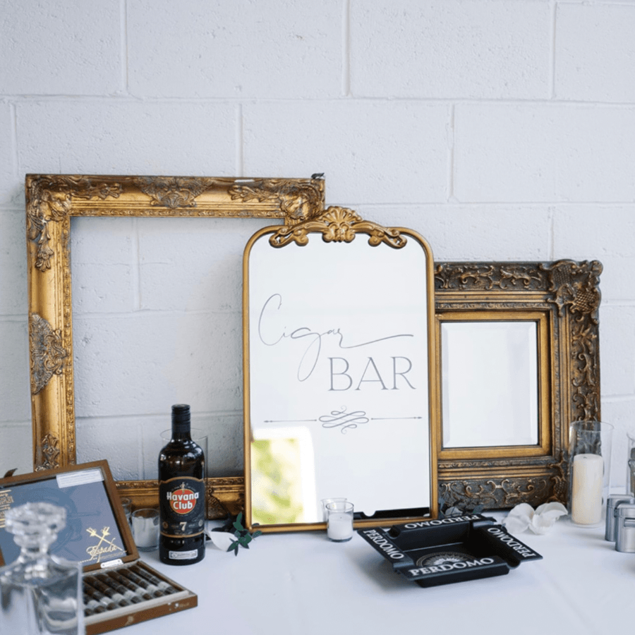 A Table With A Cigar And A Laser Engraved Mirror