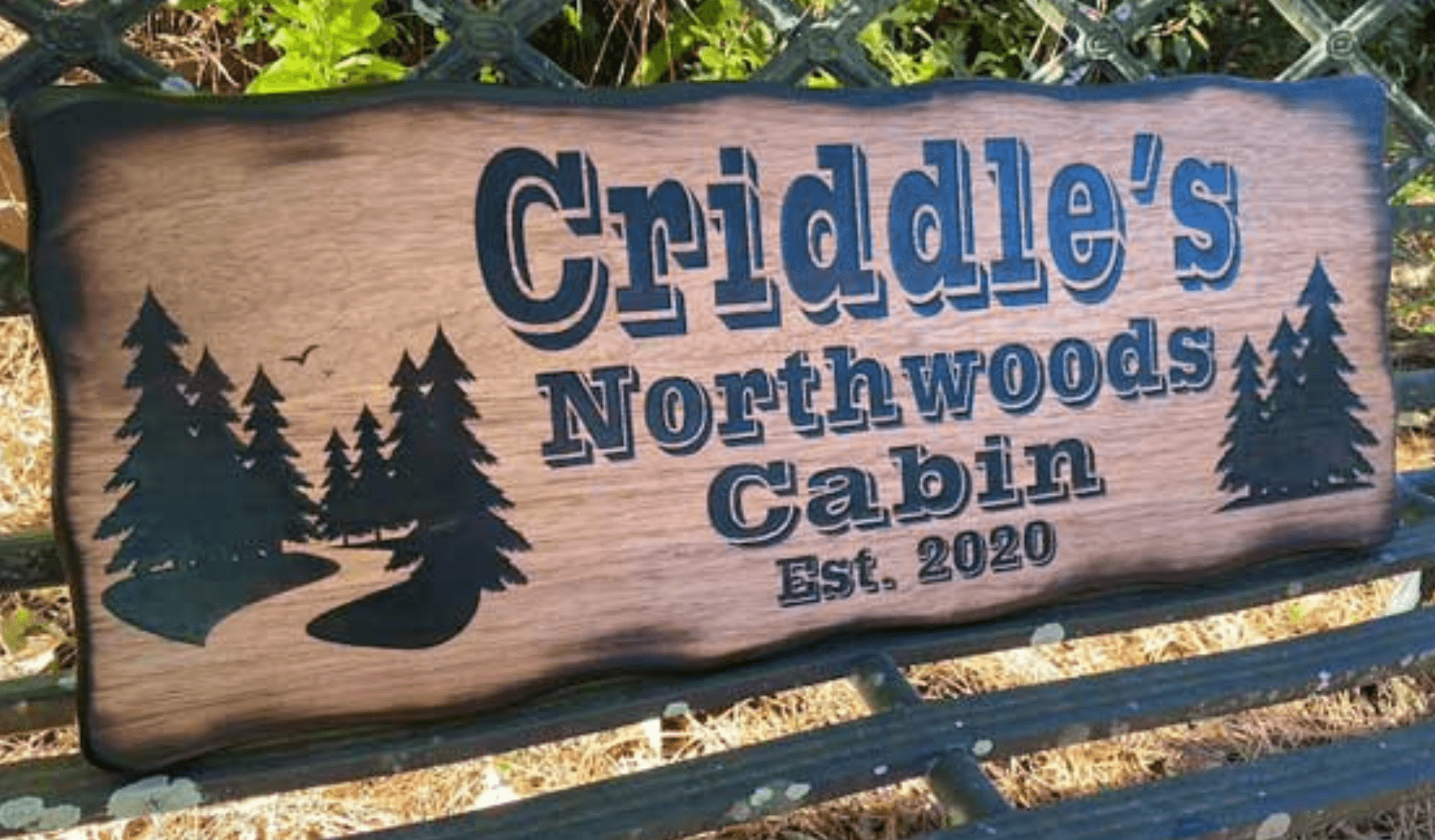 Laser engraved wood sign: Criddle Northwood Cabin.