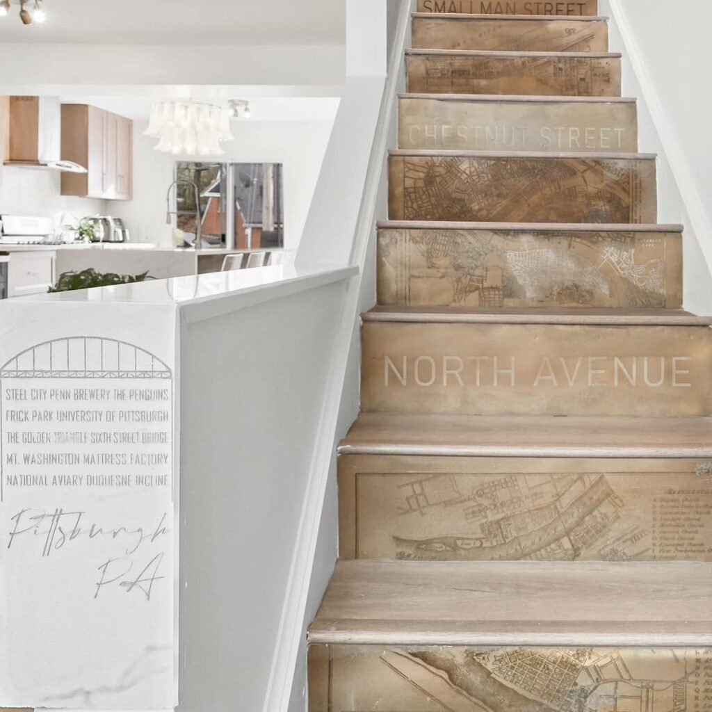 A photo of a set of laser engraved metal stairs.