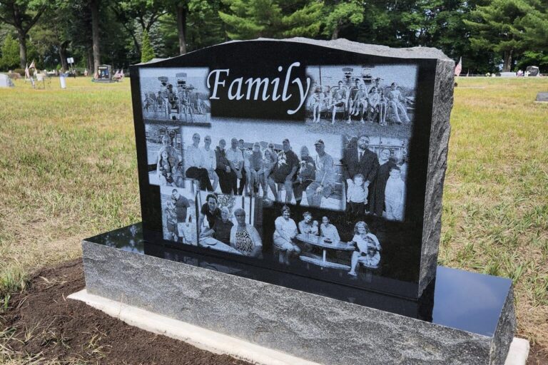 Granite Monument with a family photo monGranite monument featuring a laser-etched family photo montage.Tage laser etching