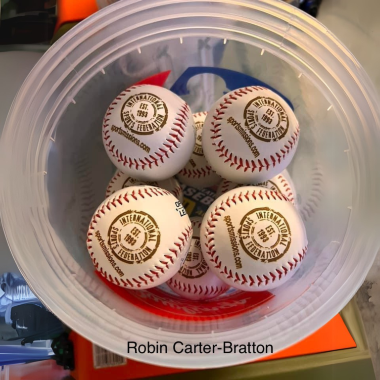 Bucket of leather baseballs engraved with "International Sports Federation" logo and website using AP Lazer.