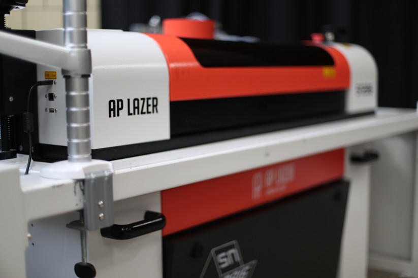 Close up of a CO2 laser engraving machine